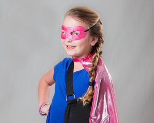 Girl dressed up as super hero
