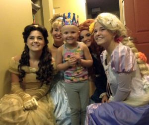 McGee daughter with Disney Princesses