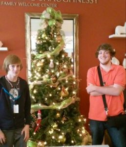 Taylor brothers with Christmas tree