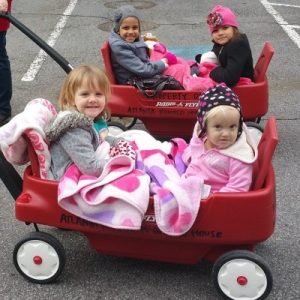 Atlanta RMHC children in red wagon