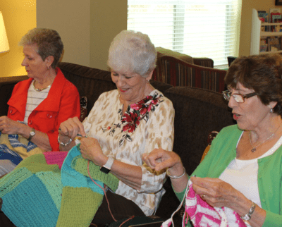 Three women knitting