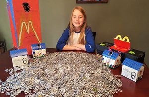 Reagan and her donated pop tabs