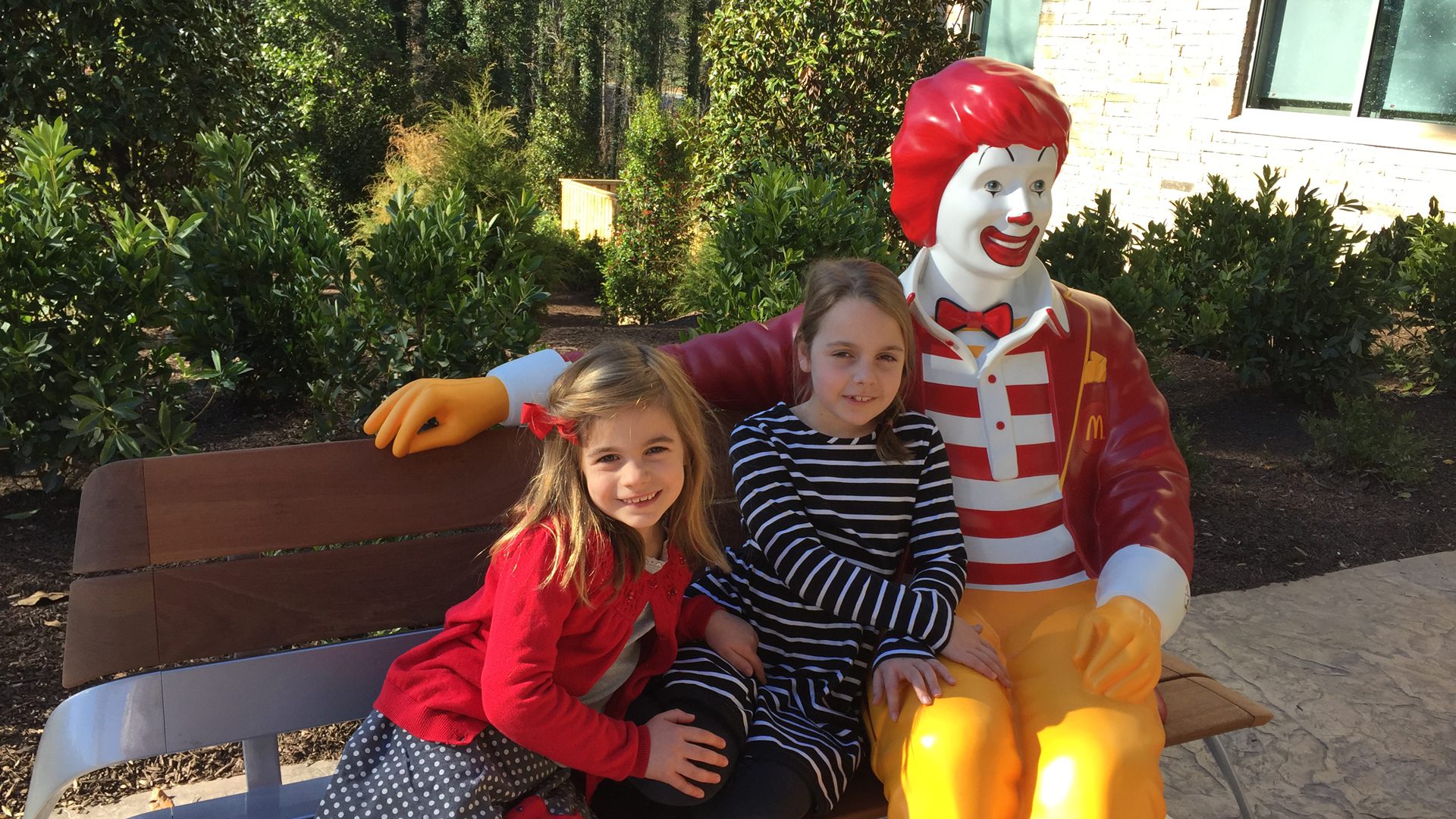 Little Girls on Bench with Ronald
