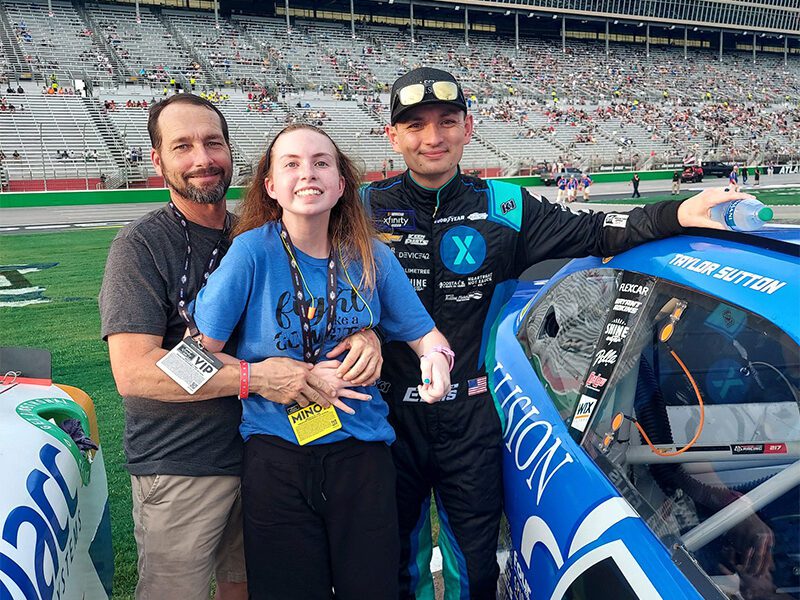 Taylor Sutton with her dad and Ryan Ellis